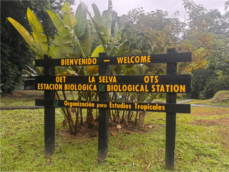 A sign in Spanish welcoming people to the La Selva Biological Station in Costa Rica.